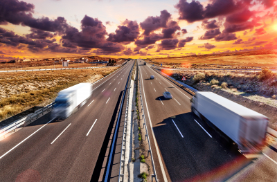 trucks carrying goods on the highway